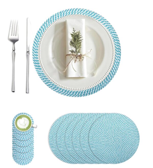 Blue and white woven braided placemat set arranged on a dining table with a white plate, napkin, fork, and knife.