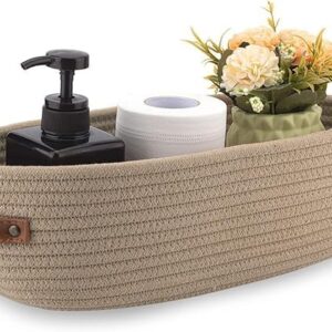 Beige woven rope storage basket with leather handles for home organization